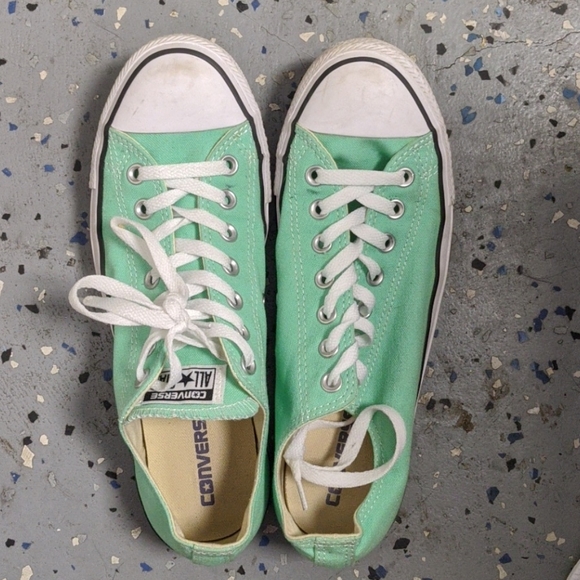 Mint colored Converse low top sneakers